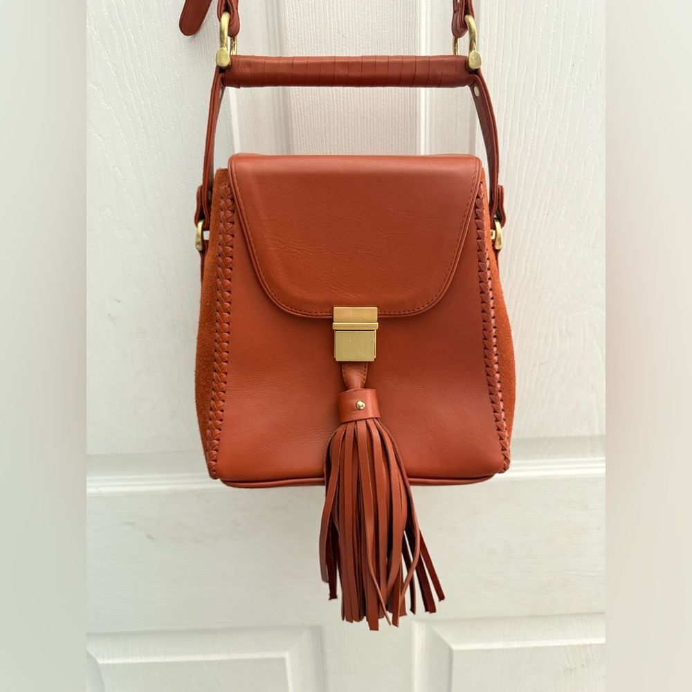 Sancia the Mini Milla Jet Set leather tassel Bag Cognac with adjustable strap